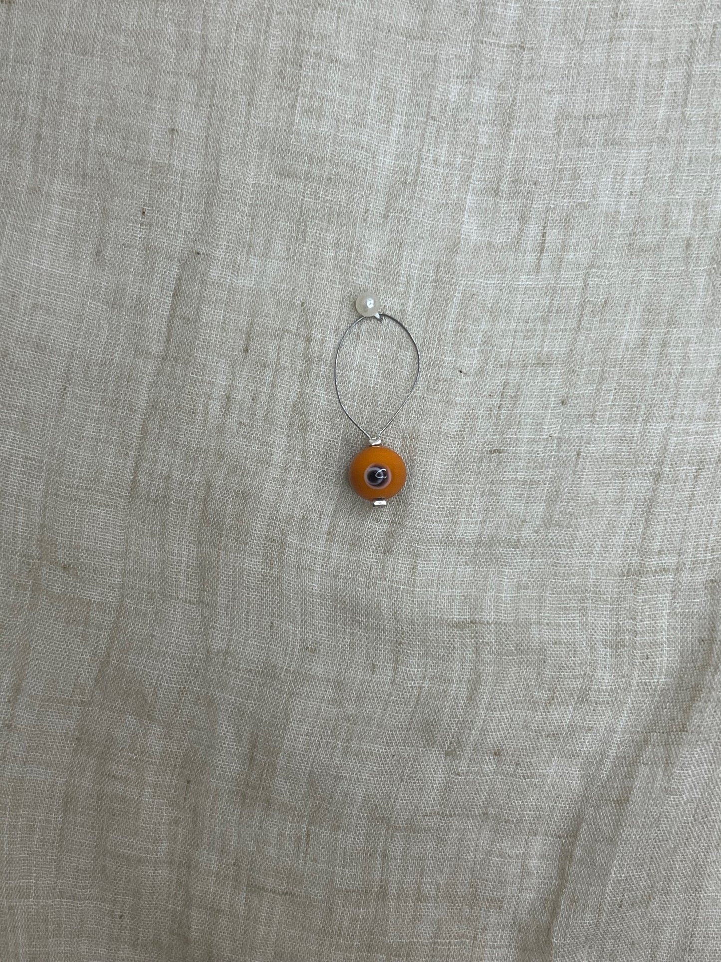 Mask marker with beautiful, orange pearl w/eye and silver wire, 1 pc.