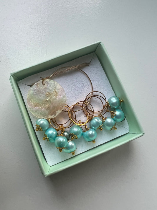 Mask markers with turquoise freshwater pearls and gold-plated flat rings, 10 pcs.